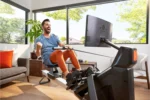 Aviron Strong Series Rower: 22″ HD Touchscreen, Dual Air & Magnetic Resistances up to 100 lbs. Game-Based Workouts, Streaming, Compact Designs - Image 4